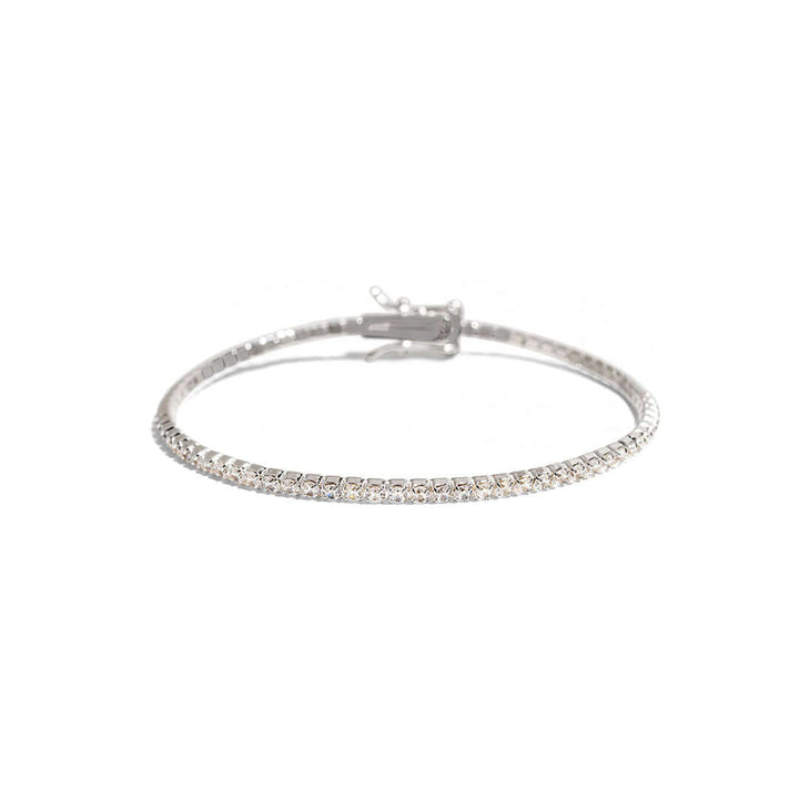 Alice Tennis Bracelet featuring a dainty and elegant design with subtle sparkle, perfect for stacking or solo wear.