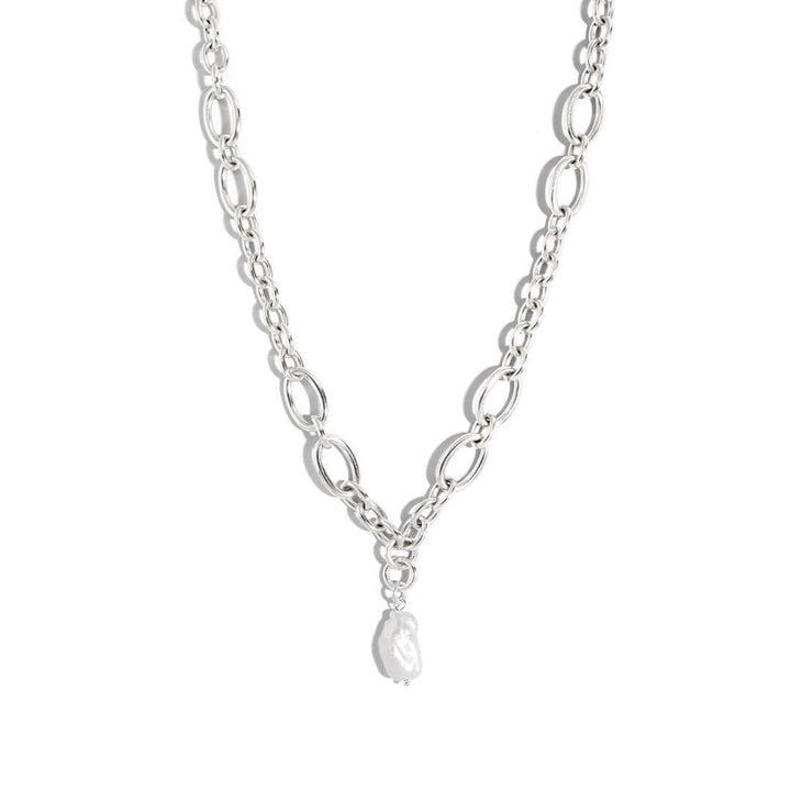 Lotus Chain Necklace featuring a bold curb chain design with a single freshwater pearl accent.