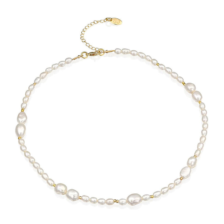 Monaco Necklace featuring mixed pearl sizes and tiny gold beads for an elegant touch.