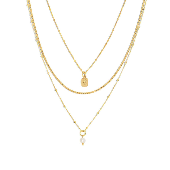 Nice Necklace featuring triple-layer chains for effortless layering and maximum style.