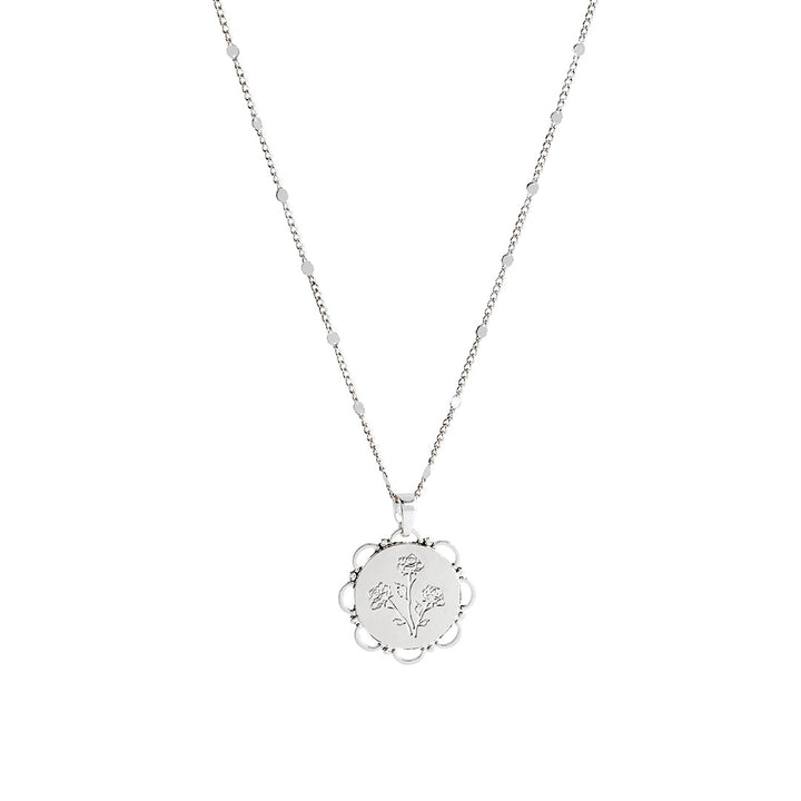 Lace Necklace featuring an elegant pendant engraved with roses, adding a romantic touch to any outfit.