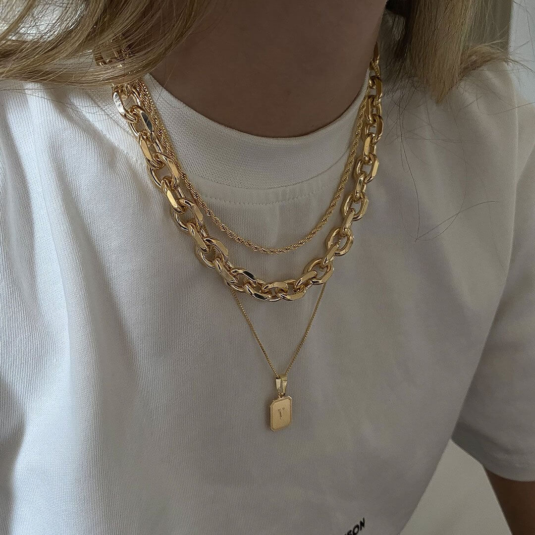 Dylan Necklace Set featuring layered Mali, Dylan, and Vintage Initial Necklaces worn together.