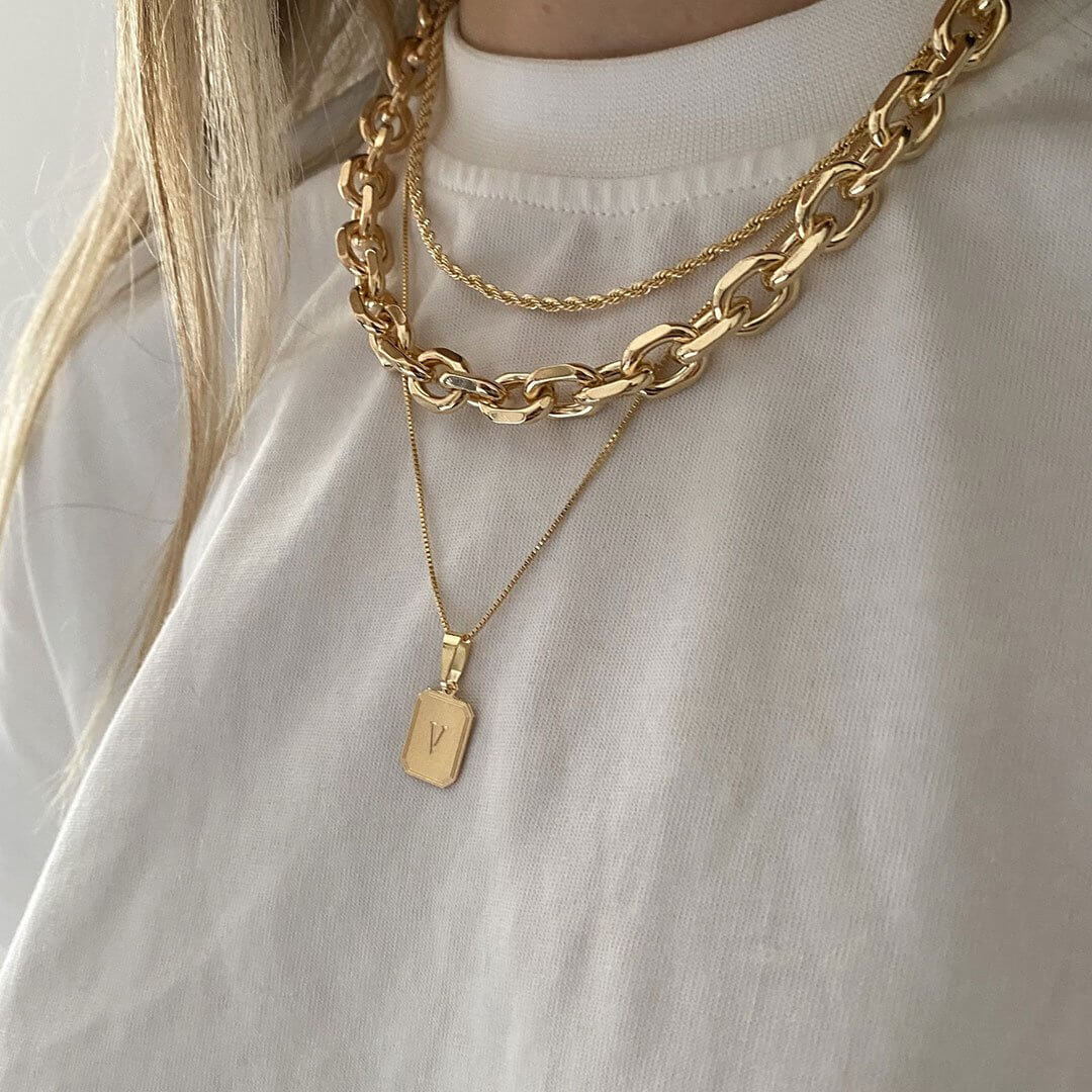 Dylan Necklace Set featuring layered gold necklaces including Mali, Dylan, and Vintage Initial Necklace.