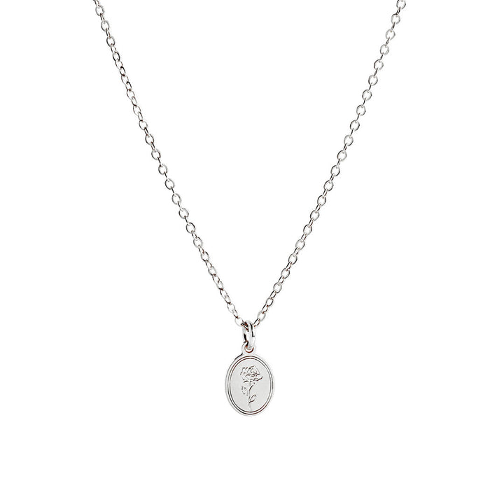 Eva Necklace featuring a delicate link-chain design and an oval pendant with a soft rose detail.