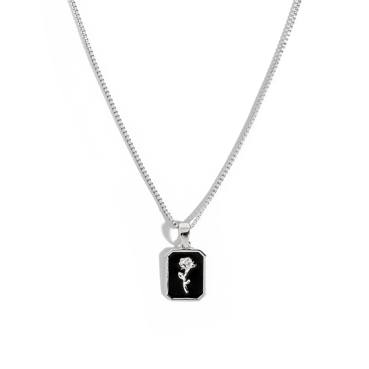 Black Rose Necklace featuring a vintage-inspired black rose pendant with intricate detailing.