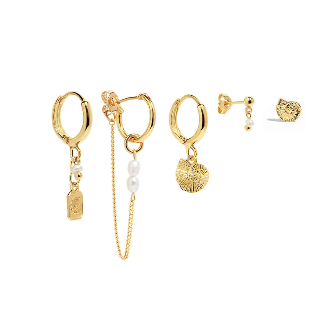 Reef Earrings Set featuring gold hoops, shells, and natural pearls for a trendy ocean-inspired look.