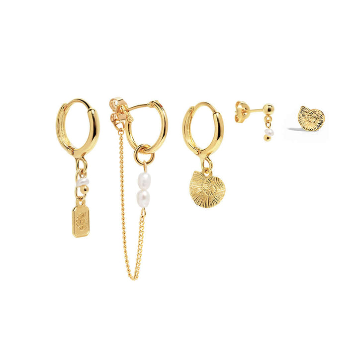 Reef Earrings Set featuring gold hoops, shells, and natural pearls for a trendy ocean-inspired look.