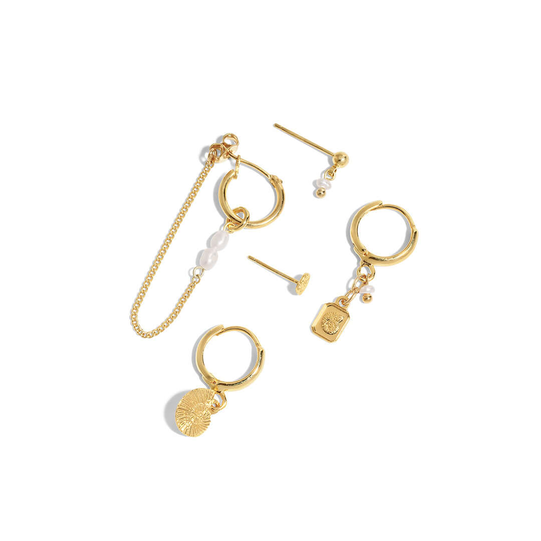 Reef Earrings Set featuring gold hoops, shells, and pearls for an ocean-inspired style.