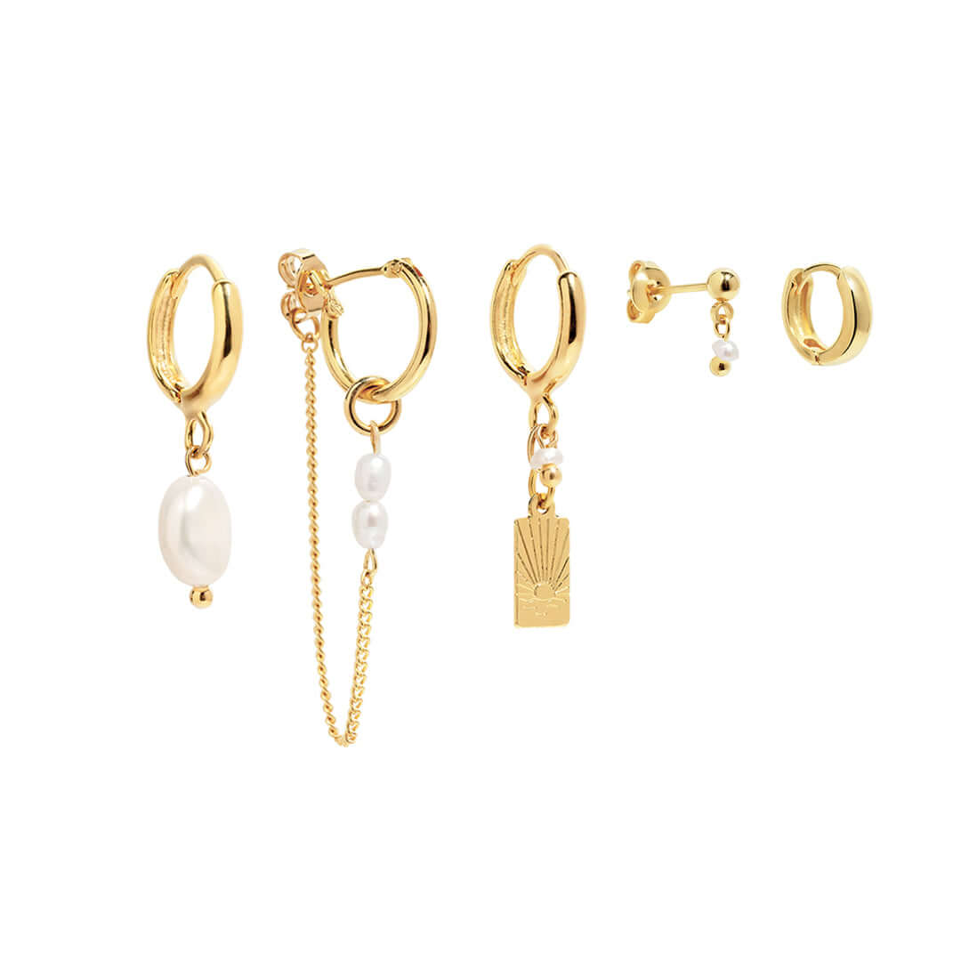 Sunset Earrings Set featuring gold hoops, pearl accents, and engraved sunset charm for a unique touch.
