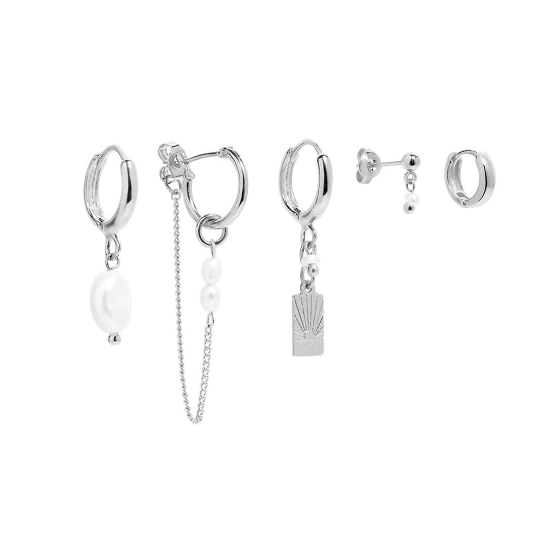 Sunset Earrings Set featuring elegant designs with charms and pearls, perfect for everyday wear.
