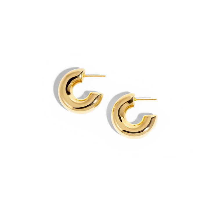 Stylish Mango Earrings in a glossy gold finish, perfect for adding a touch of elegance to any outfit.