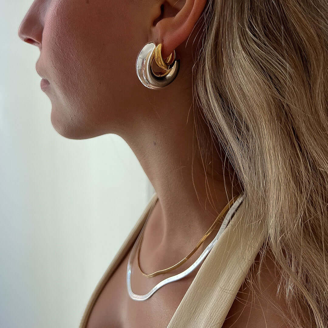 Mango Earrings showcased on a model, highlighting the elegance of this stylish jewelry piece.