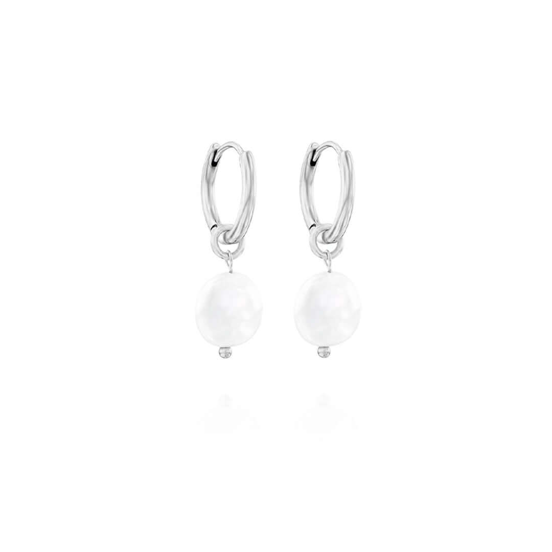 May Earrings featuring delicate hoops with freshwater pearls, perfect for elevating your style day or night.