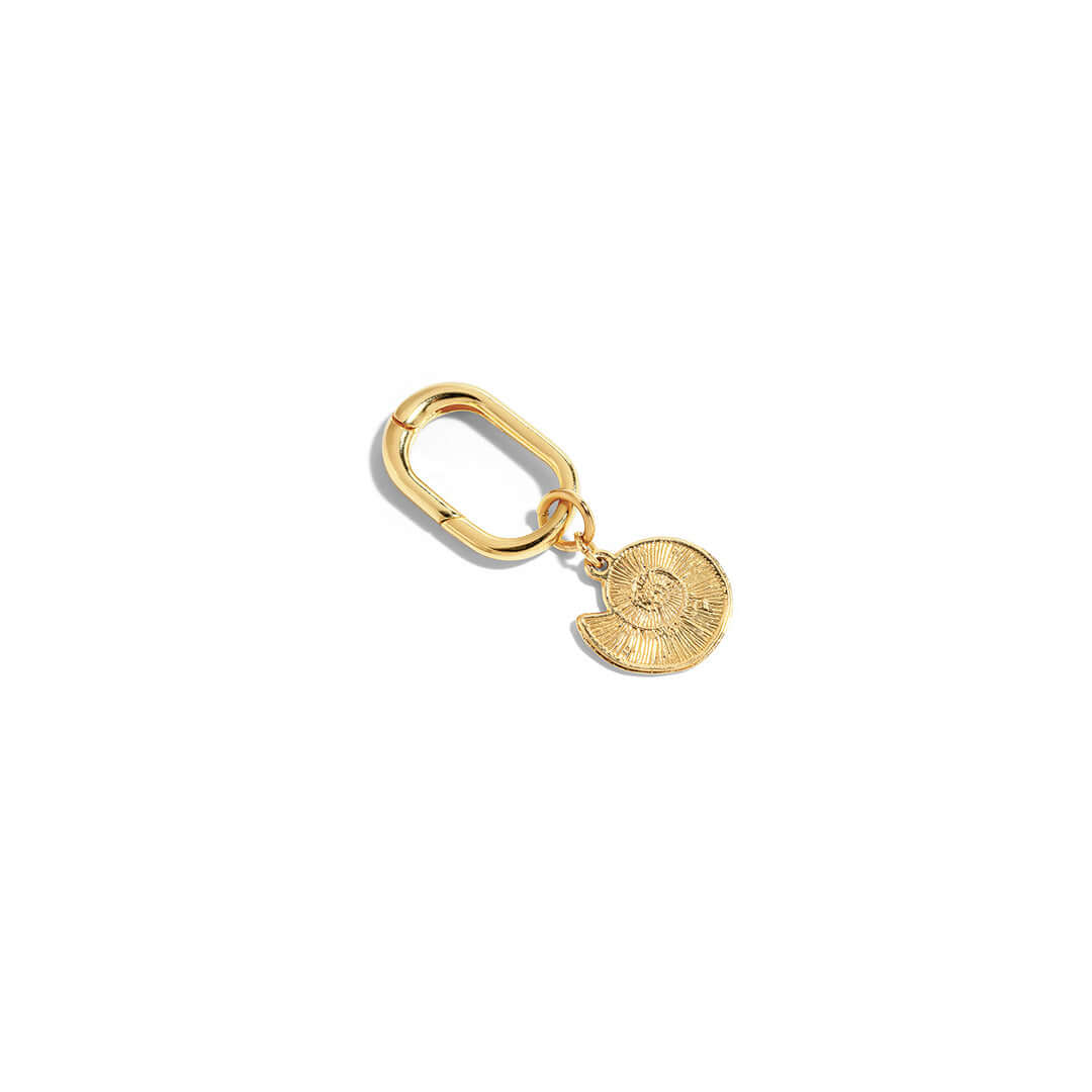 Gold Shell Charm accessory for bags, wallets, and keys, adding a personal touch to any item.