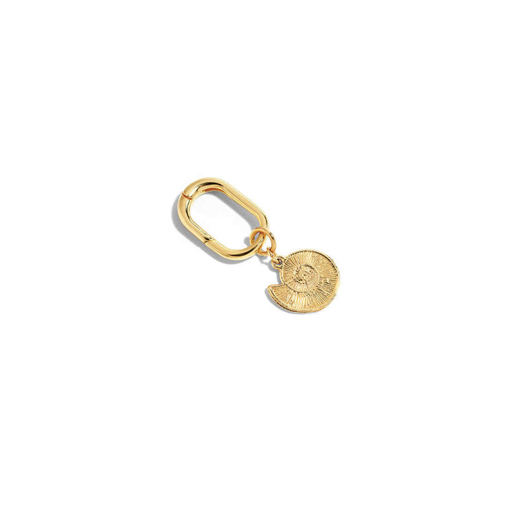 Gold Shell Charm accessory for bags, wallets, and keys, adding a personal touch to any item.