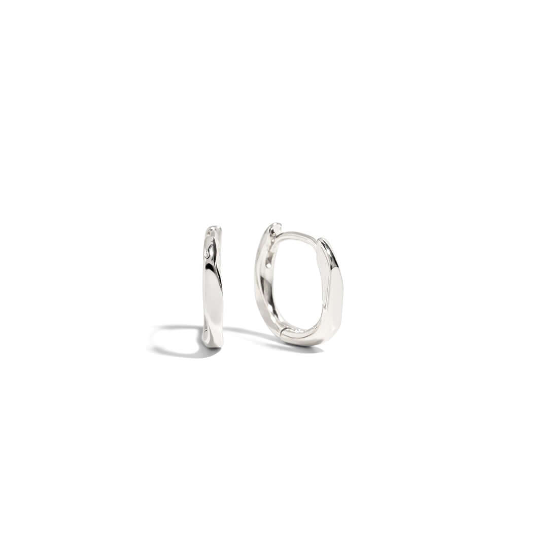 Claire Hoop Earrings featured in a sleek, lightweight design, perfect for any occasion.
