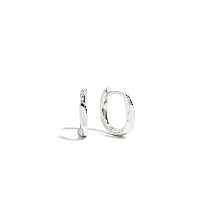Claire Hoop Earrings featured in a sleek, lightweight design, perfect for any occasion.